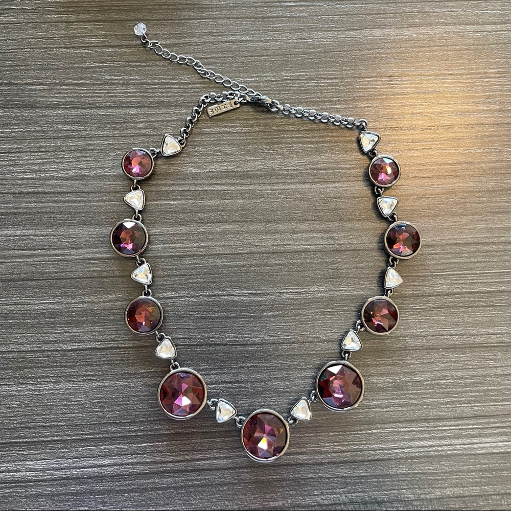White House black market purple necklace.